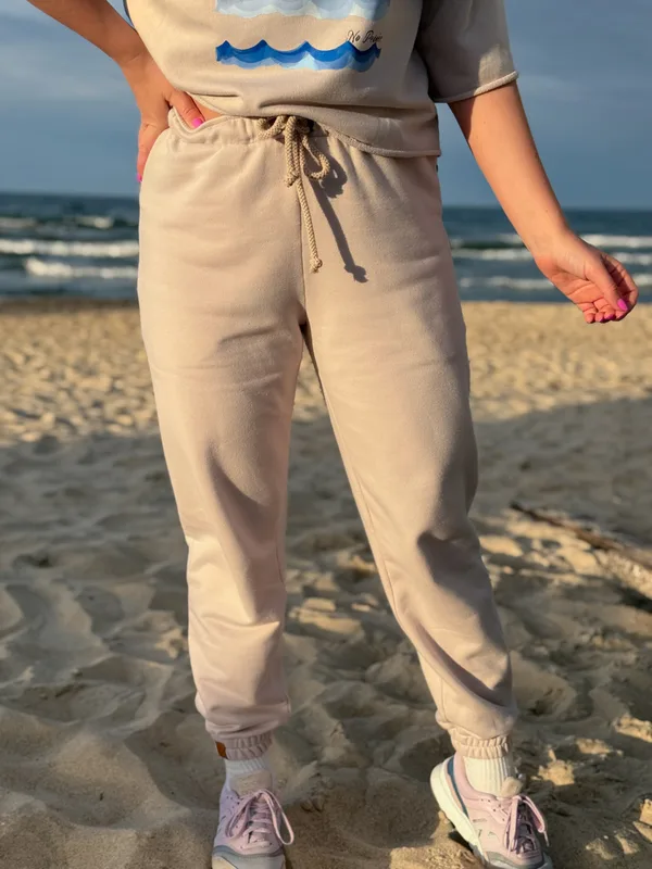 Spodnie joggery chłodny beż — No Pewnie